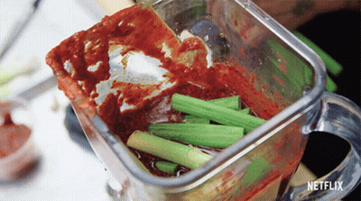 A Blender Filled With Vegetables And Sauce With A Netflix Logo On The Bottom GIF