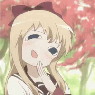 A Blonde Anime Girl Is Making A Funny Face With Her Hands On Her Chin . GIF