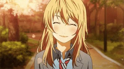 A Blonde Anime Girl With Long Hair And A Tie Is Smiling . GIF