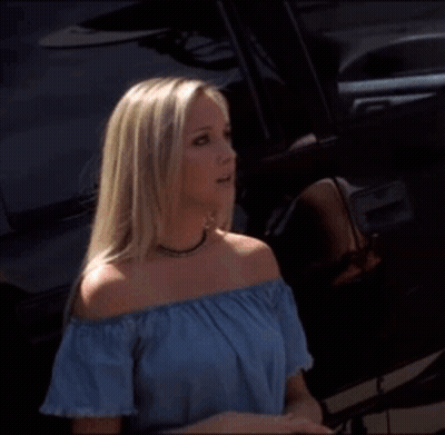 A Blonde Woman In A Blue Off The Shoulder Top Says I 'M Down GIF