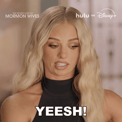 A Blonde Woman Says Yeesh In Front Of A Disney Logo GIF