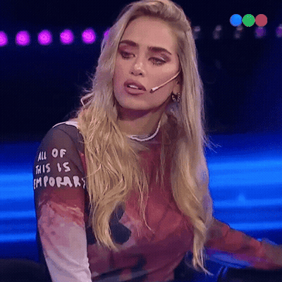 A Blonde Woman Wearing A Shirt That Says All Of This Is Emporar GIF