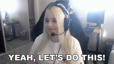 A Blonde Woman Wearing Headphones And A Microphone Says Yeah Let 'S Do This GIF