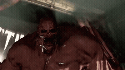A Bloody Monster Is Standing In A Dark Room With His Arms Outstretched And His Mouth Open . GIF
