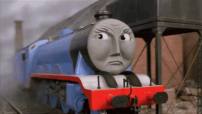 A Blue And Red Train With A Face That Says I On It GIF