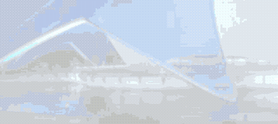 A Blue And White Building With A Reflection Of The Building In The Water . GIF
