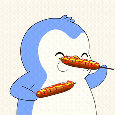 A Blue And White Penguin Holding A Hot Dog With Ketchup On It GIF