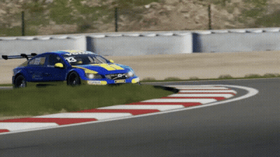 A Blue And Yellow Racing Car With The Number 13 On It GIF