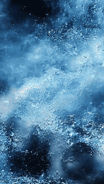 A Blue Background With A Lot Of Small Bubbles On It GIF