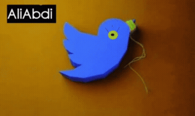 A Blue Bird With A Yellow Beak Is On A Yellow Background With The Name Aliabdi GIF
