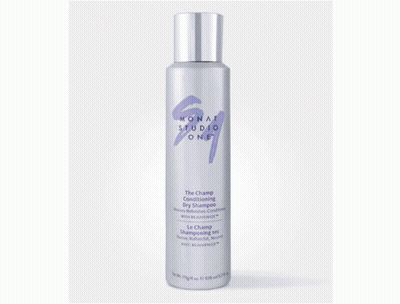A Blue Bottle Of Monat Conditioner On A White Surface GIF