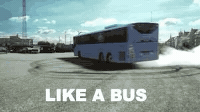 A Blue Bus Is Driving Down A Road With The Words `` Like A Bus '' Written On The Bottom . GIF