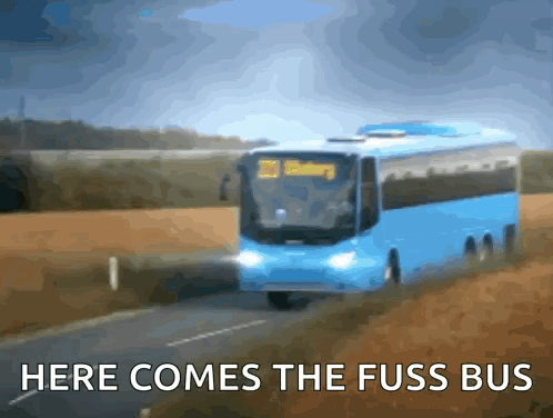 A Blue Bus On A Road With The Words Here Comes The Fuss Bus Below It GIF