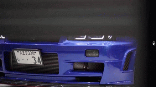 A Blue Car Has A License Plate Number 34 GIF