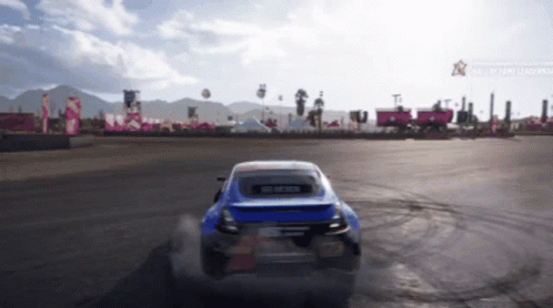 A Blue Car Is Driving Down A Road With Mountains In The Background And A Sign That Says " End Of Day Learning " GIF