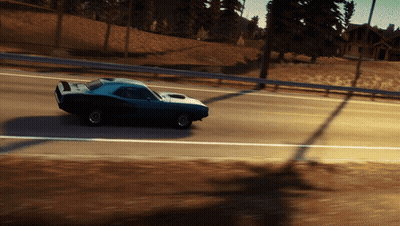 A Blue Car Is Driving Down A Road With Trees In The Background GIF