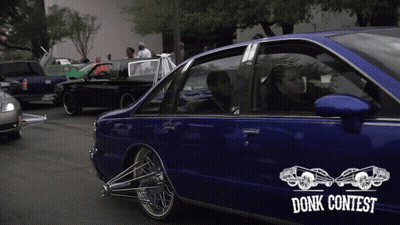 A Blue Car With A Sticker That Says Donk Contest On It GIF