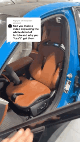 A Blue Car With Brown Seats Has A Reply From Someone Asking If They Can Make A Video Explaining The Whole Debut GIF