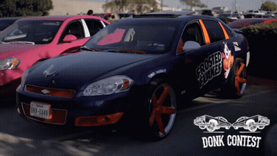 A Blue Car With Frosted Flakes On The Side Is Parked Next To A Pink Car GIF