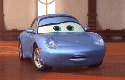 A Blue Cartoon Car With Green Eyes And A Surprised Look On Its Face GIF