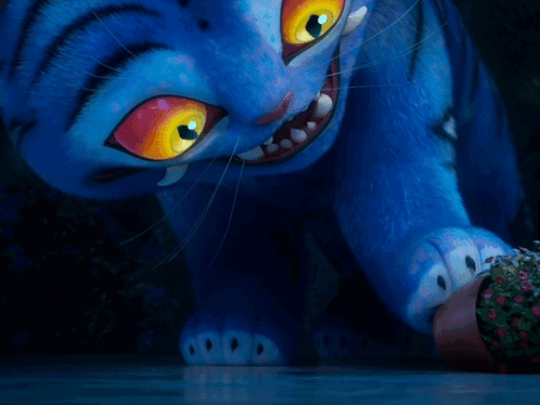 A Blue Cartoon Cat With Yellow Eyes Is Looking At Something GIF