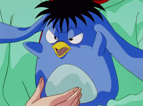A Blue Cartoon Character With A Yellow Beak GIF