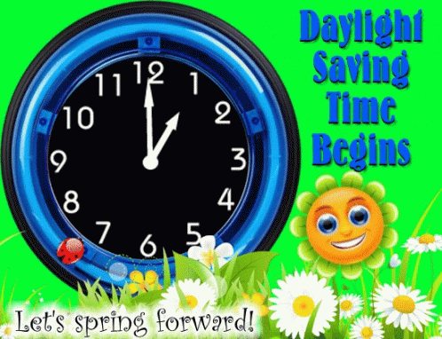 A Blue Clock With The Words Daylight Saving Time Begins Below It GIF