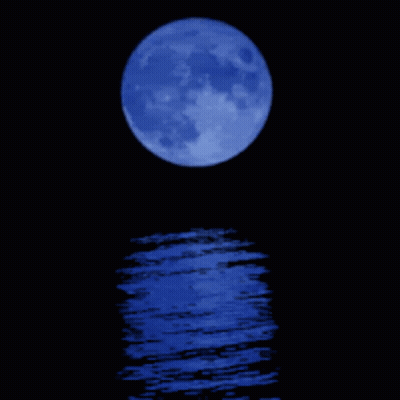 A Blue Full Moon Is Reflected In A Body Of Water GIF