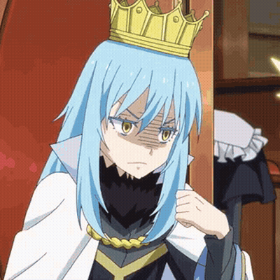 A Blue Haired Anime Girl With A Crown On Her Head . GIF