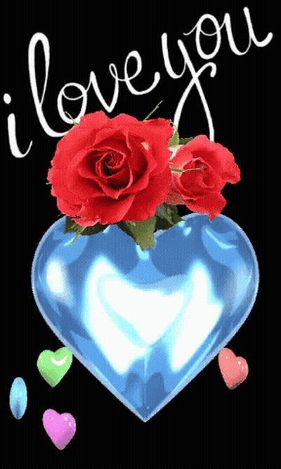 A Blue Heart With Red Roses In It And The Words " I Love You " GIF