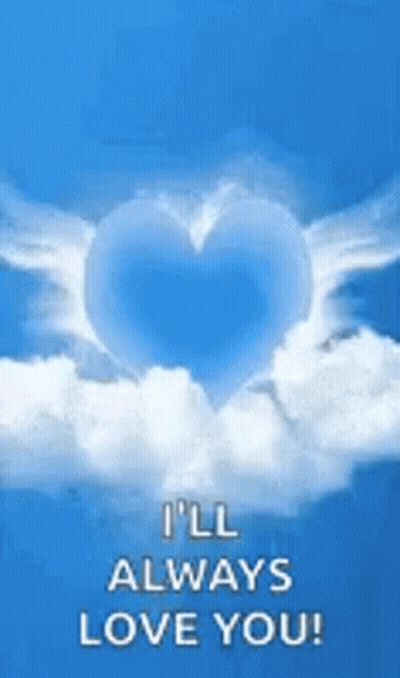 A Blue Heart With White Wings Is Floating In The Clouds . GIF