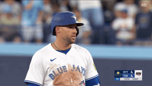 A Blue Jays Player Stands On The Field During A Game GIF