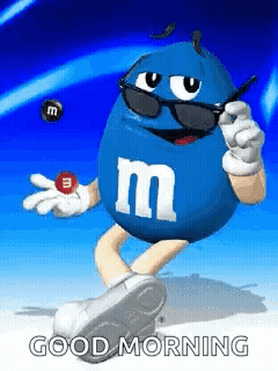 A Blue M & Ms Character Wearing Sunglasses And Holding A M & M . GIF