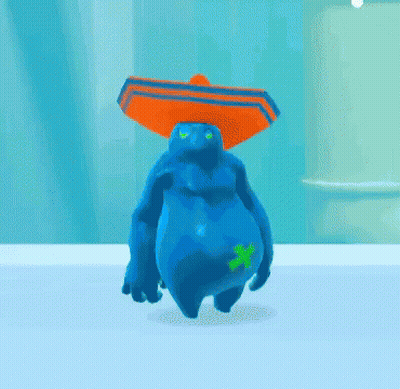 A Blue Monster Wearing An Orange Sombrero With A Green Leaf On Its Back GIF