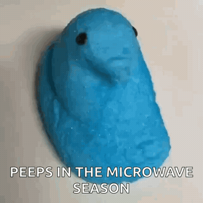 A Blue Peeps Candy With The Words Peeps In The Microwave Season Written Below It GIF