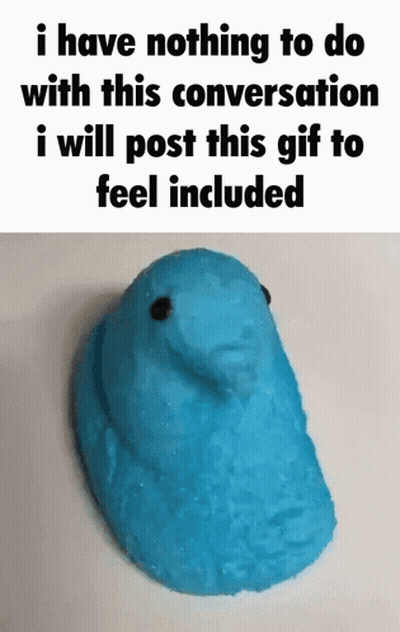 A Blue Peeps Marshmallow With A Face On It GIF