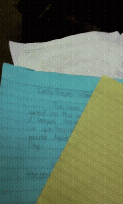 A Blue Piece Of Paper With Lady Trooper Written On It Sits On Top Of A Yellow Piece Of Paper GIF