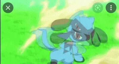 A Blue Pokemon With Red Eyes Is Standing In The Grass And Looking At The Camera . GIF