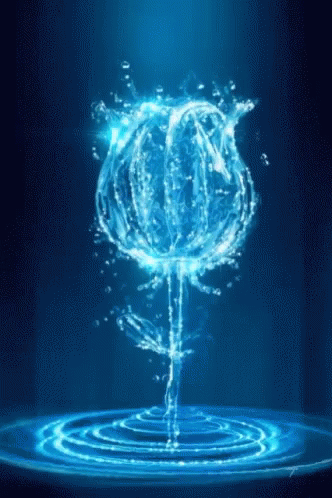 A Blue Rose Made Of Water Is Floating In The Water GIF