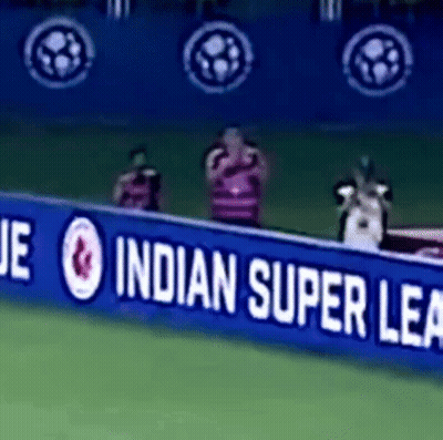 A Blue Sign That Says Indian Super League Is On A Soccer Field GIF