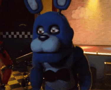 A Blue Stuffed Animal With A Bow Tie GIF