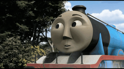 A Blue Train With A Face That Looks Surprised GIF