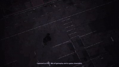 A Blue Van Is Parked In Front Of A Wall That Has The Word Entrance Painted On It GIF