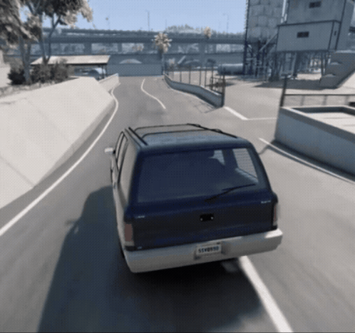 A Blue Van With A License Plate That Says Lvvpdd Drives Down A Road GIF