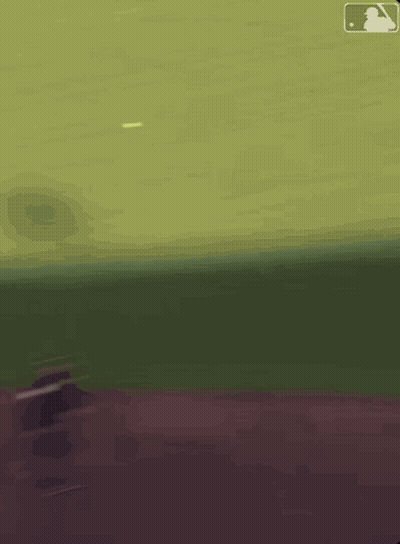 A Blurred Image Of A Baseball Field With The Mlb Logo GIF