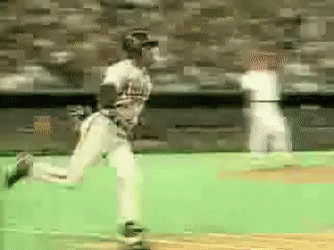 A Blurred Image Of A Baseball Game With A Pitcher Wearing A Pittsburgh Jersey GIF
