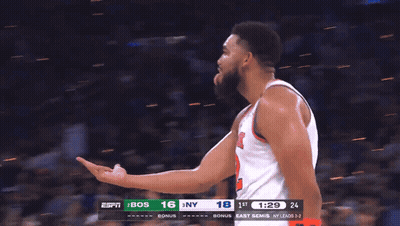 A Blurred Image Of A Basketball Game Between Bos And East Semis GIF