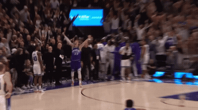 A Blurred Image Of A Basketball Game With A Player Wearing Number 23 GIF