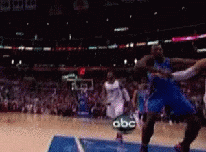 A Blurred Image Of A Basketball Game With Abc Advertising On The Side Of The Court GIF