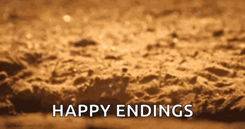 A Blurred Image Of A Beach With The Words `` Happy Endings '' Written In White Letters . GIF